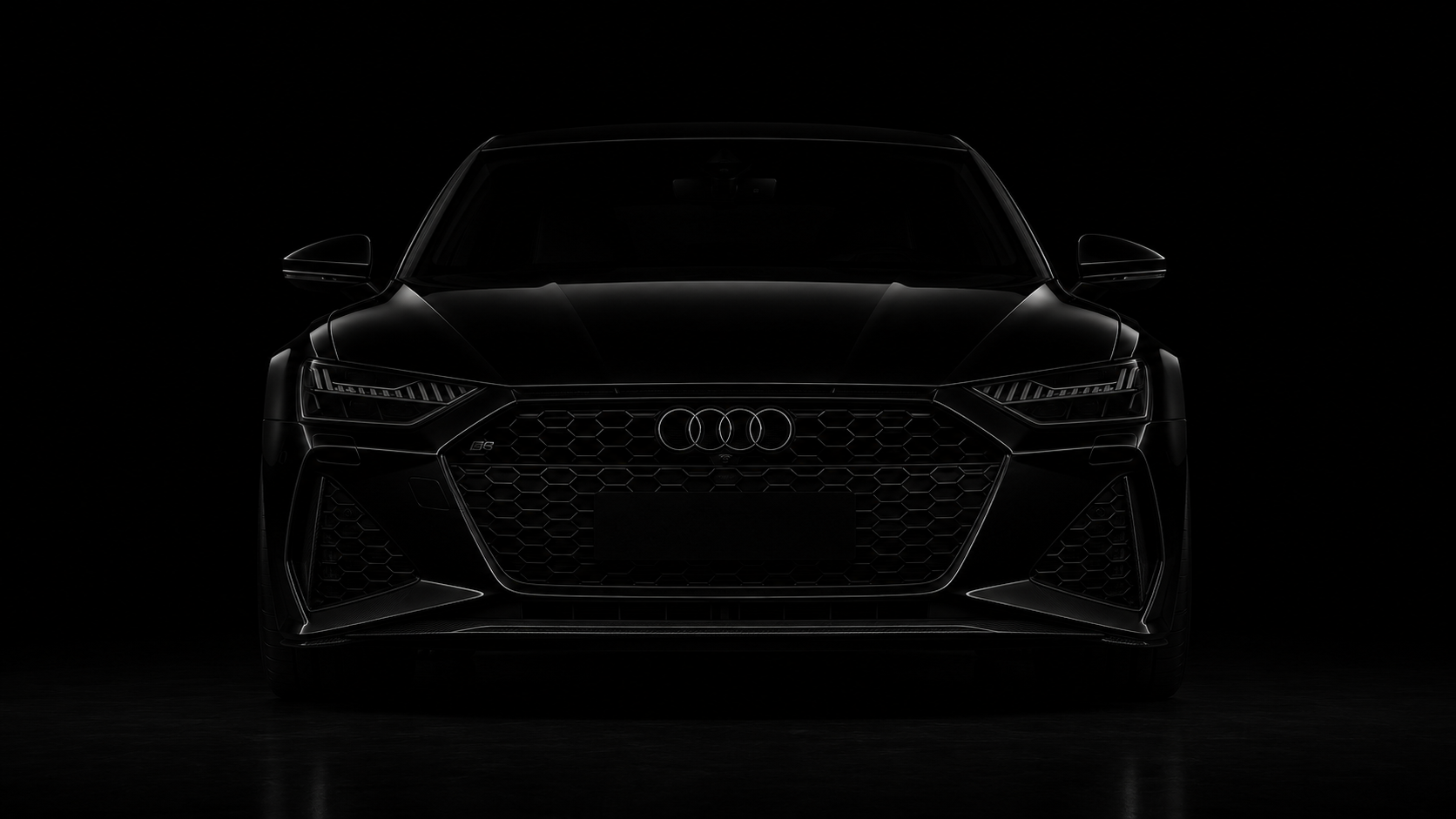 Audi noire vue de face, phares éteints